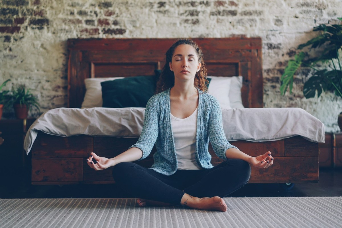 Person meditating during wellness practice